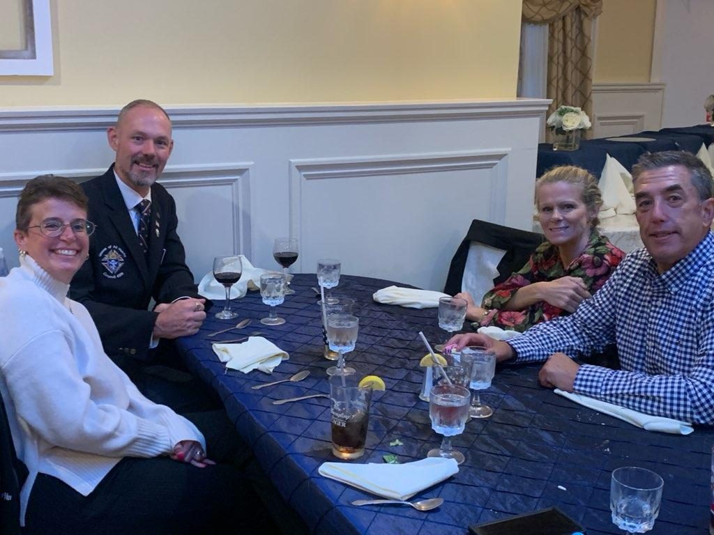 Council members and family at a dinner table after the Officer Installation